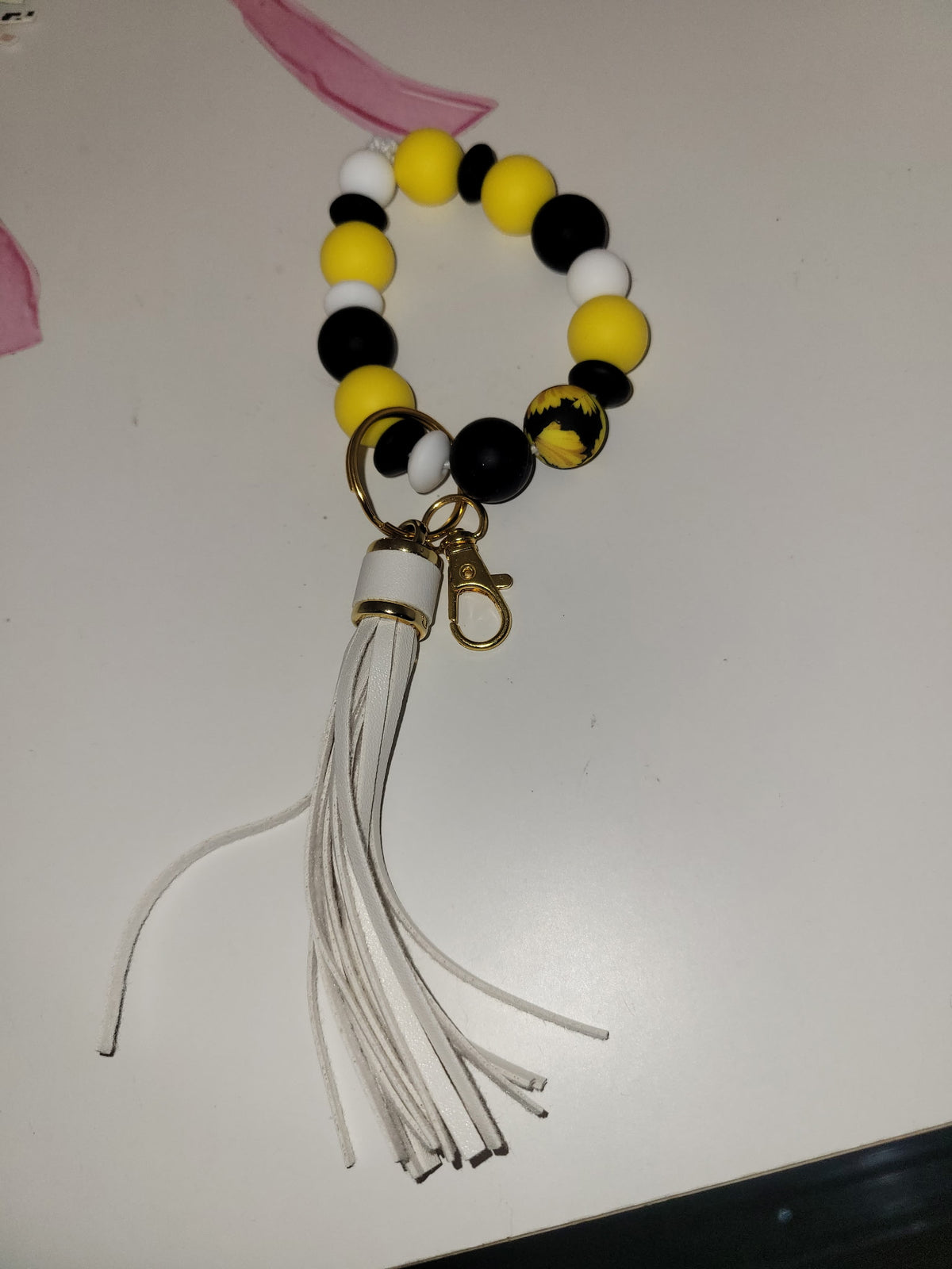Yellow and black sunflower wristlet