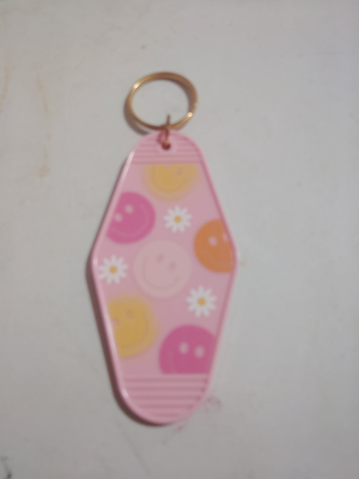 Pink smiley face keychain