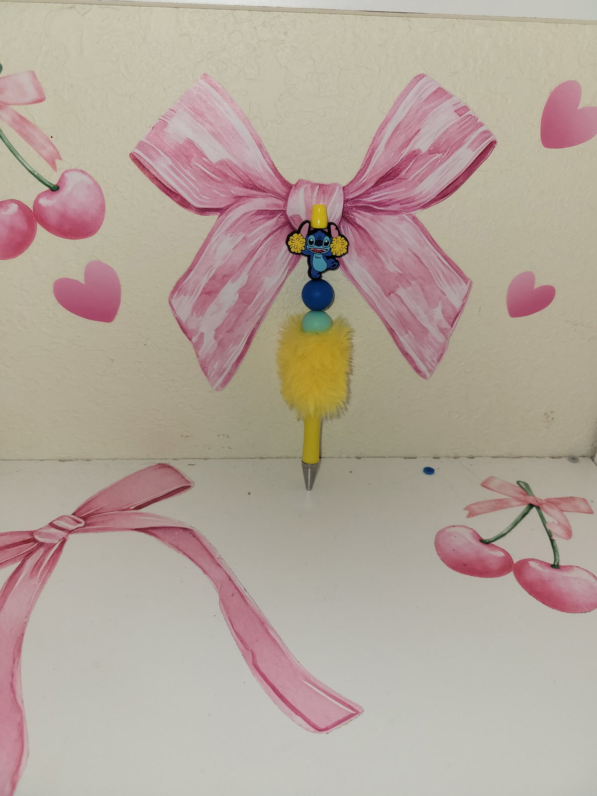 Yellow stitch cheerleader pen